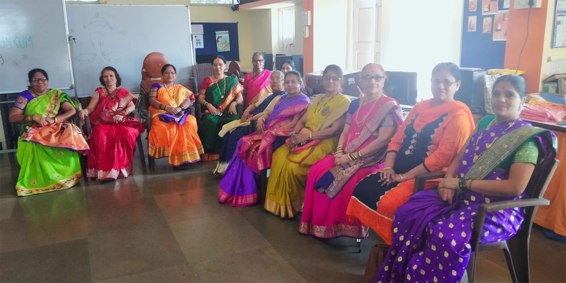 A spectrum of beautiful colours seen in the saris that the beneficiaries are wearing looking radiant and beautiful
