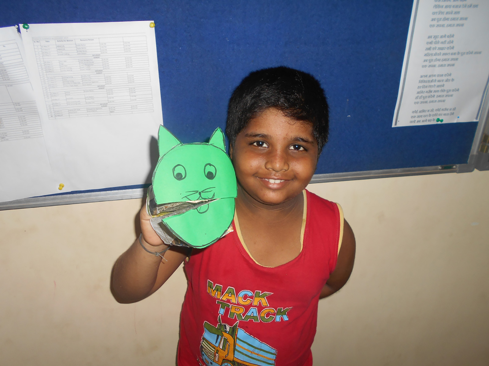 Happy face of a child after completing a puppet