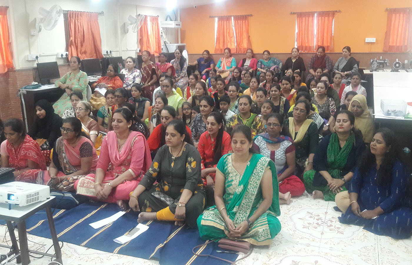 All beneficiaries in a meditation during the Tej gyaan Foundation. See the serene look on all the faces