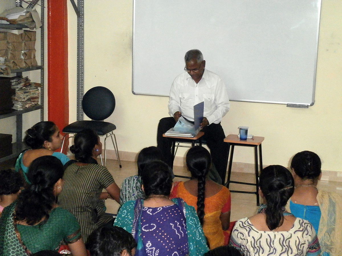 Mr. Anil Choubey explaining the laws for women (March, 2014)