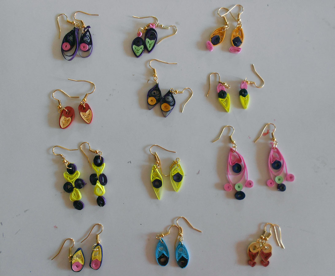 Beautiful quilled earrings made by the beneficiaries