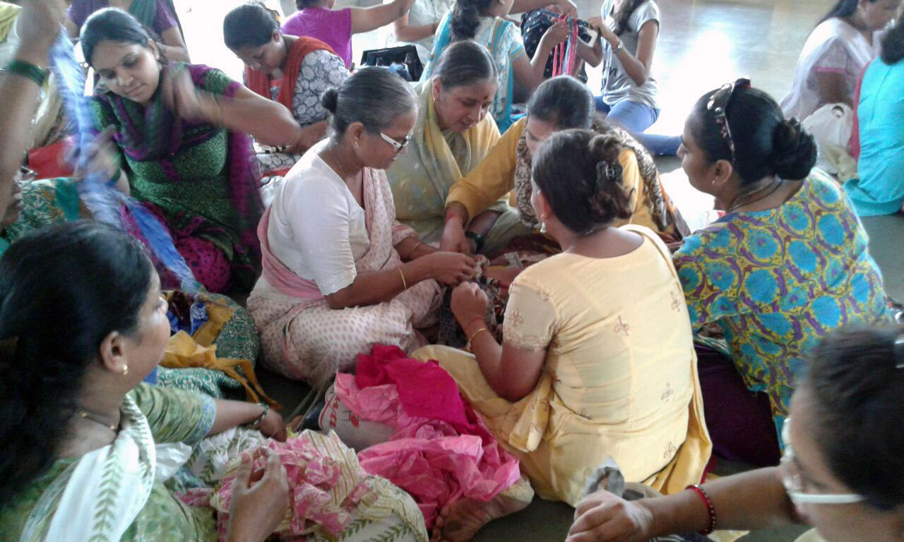 Women making bags from left over cloth
