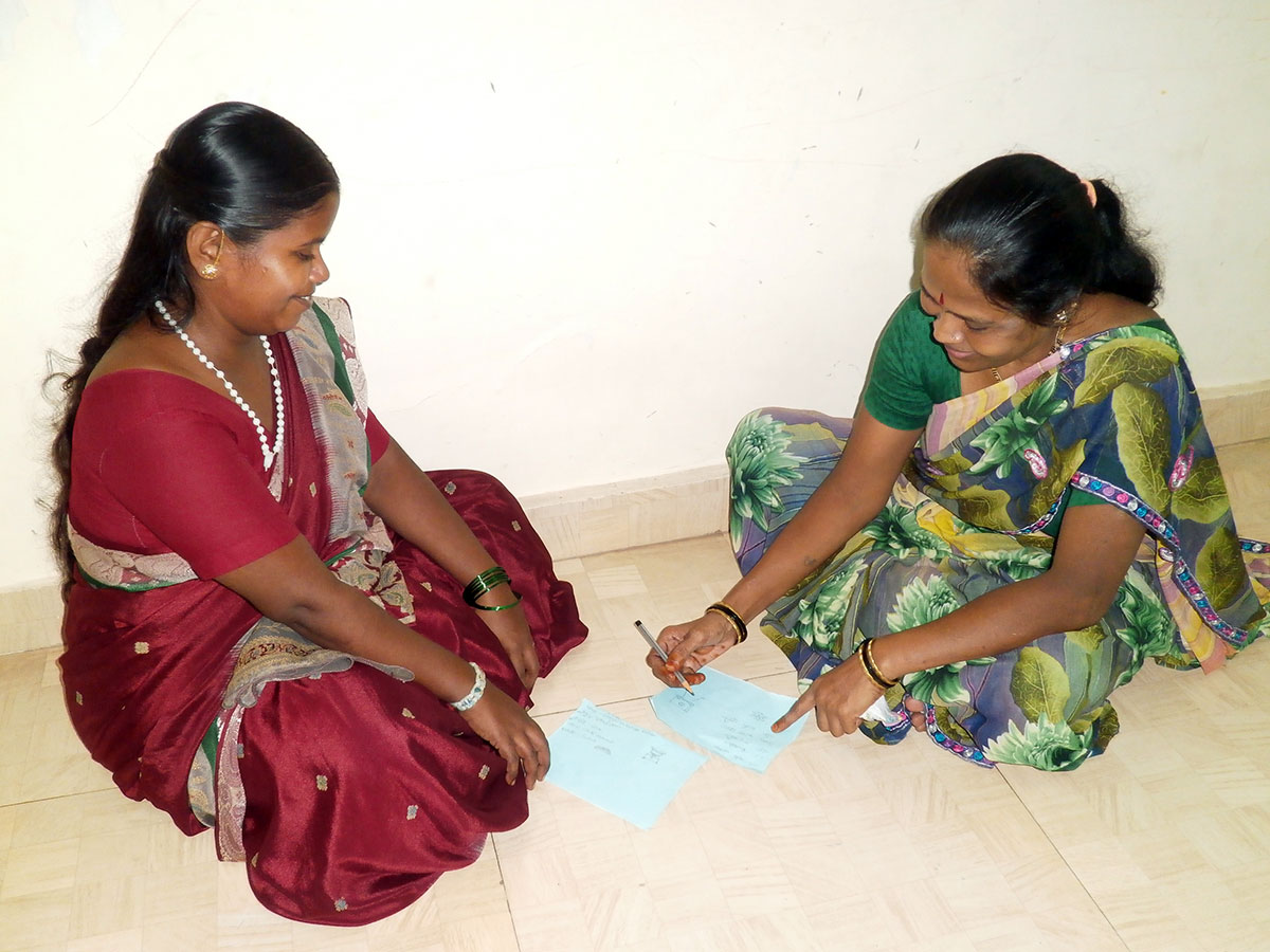 Beneficiaries filling up the feedback form at the Chai Masti session (August, 2015)