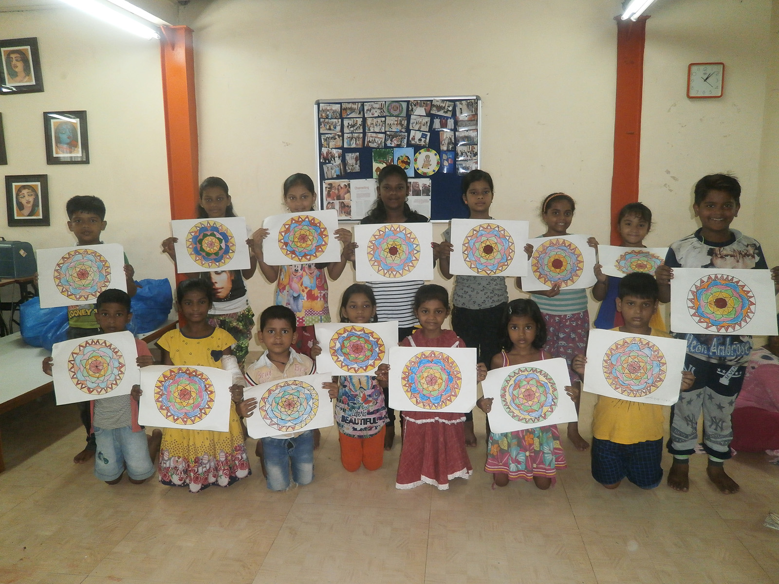 Children happy to show the drawings colored by them