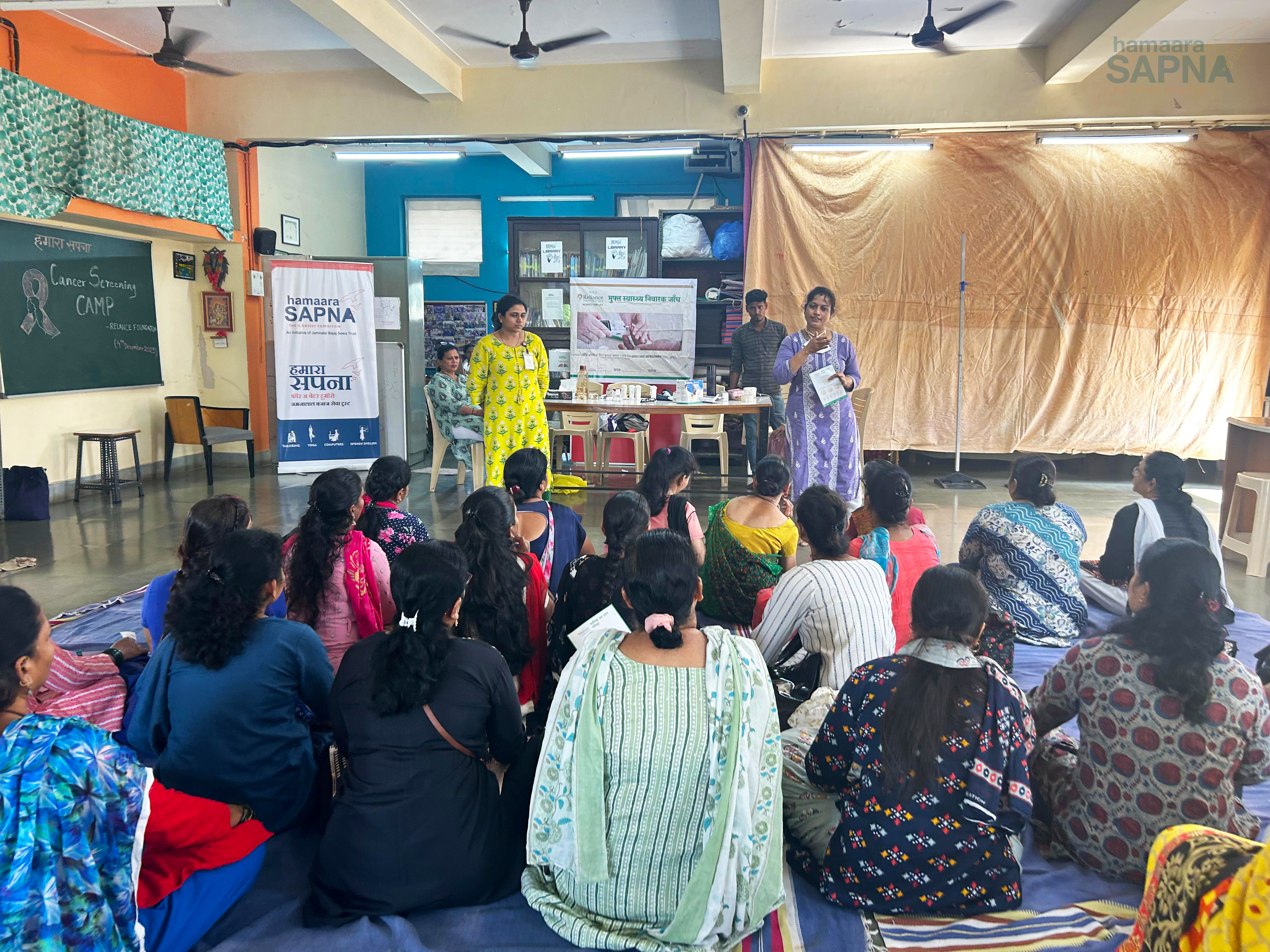 Nurses from Reliance Foundation explaining to the Beneficiaries the importance of women health covering all factors and why in today’s times it should take precedence over everything else.
