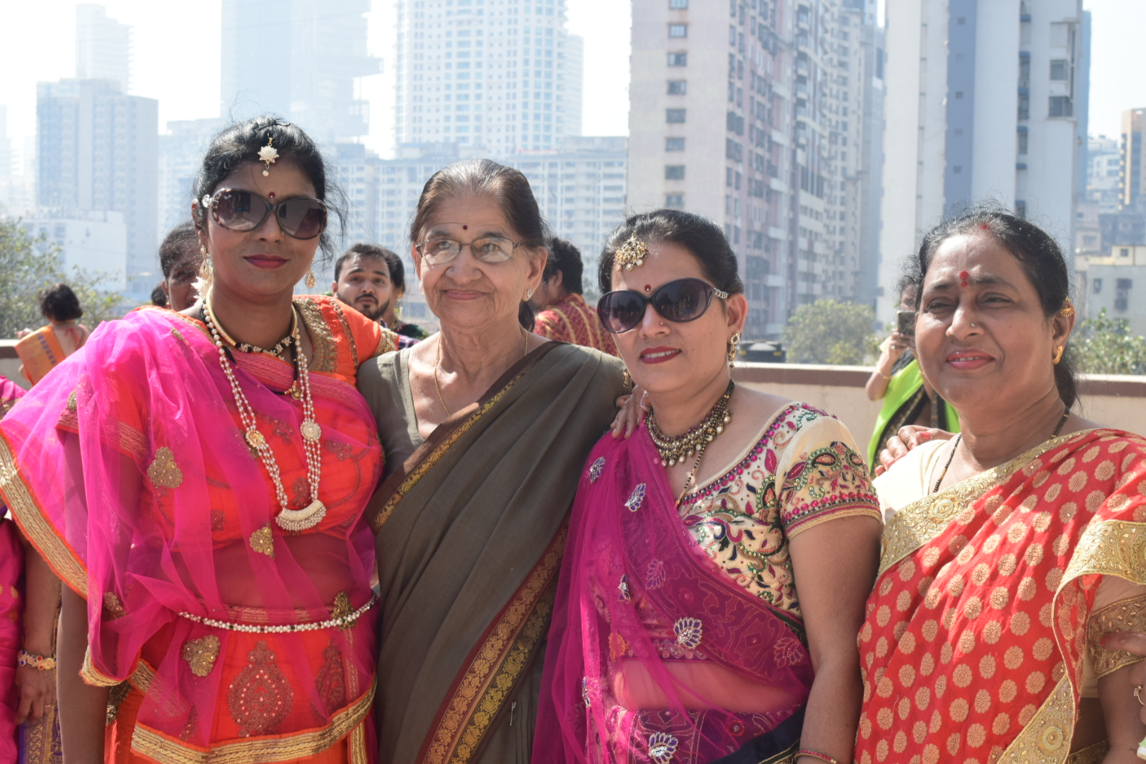 Prabha Mam with a few beneficiaries on the terrace during a kite flying event.