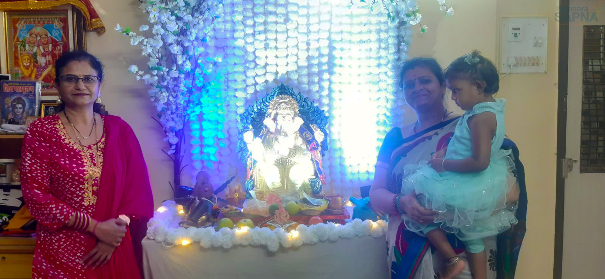 The Deputy Project Director visit a beneficiary's house to take the blessings of Lord Ganesh
