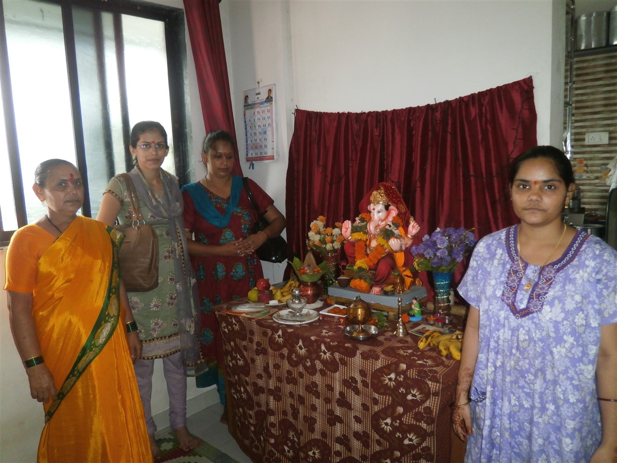 Taking the blessings of Lord Ganesha