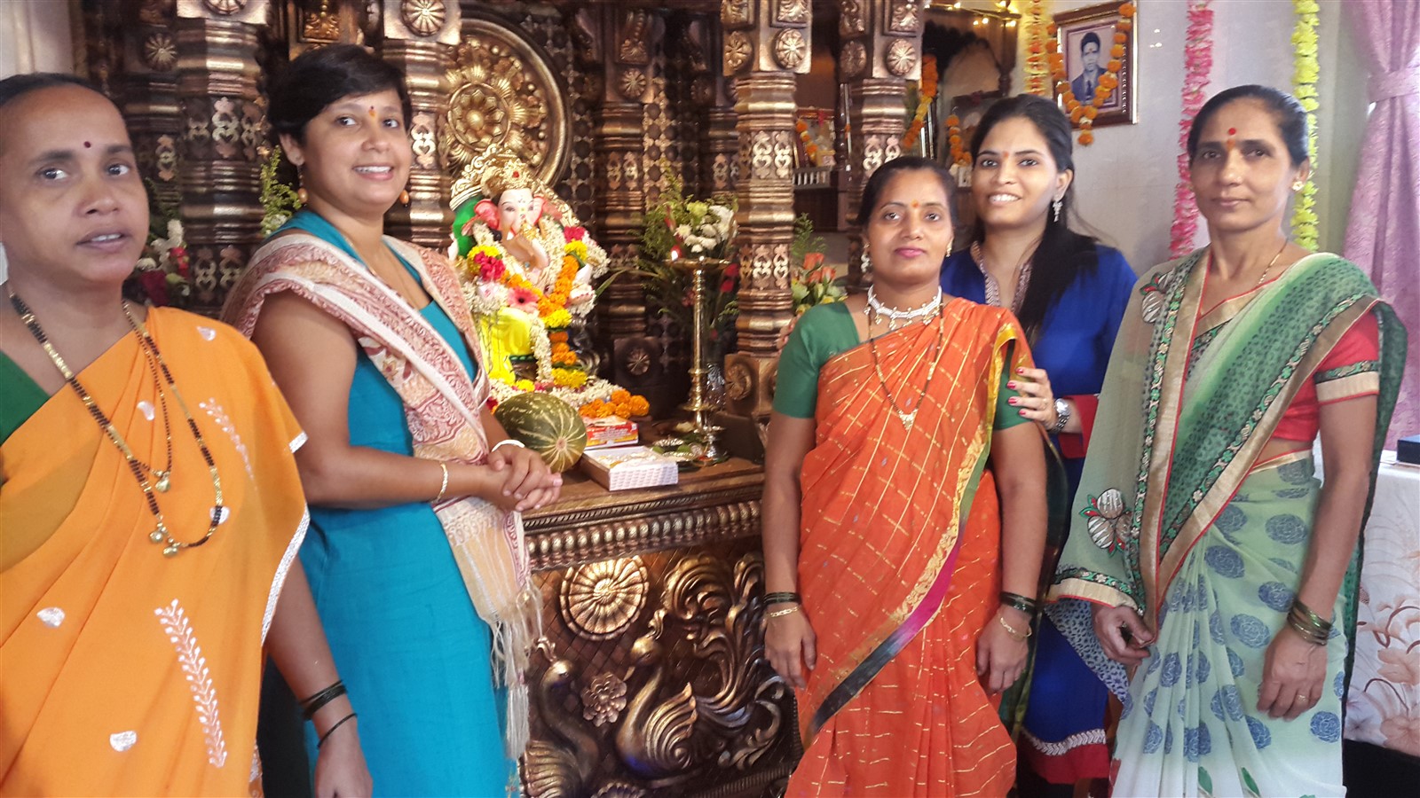 Staff visiting the women during there festival of Ganesh Chaturthi