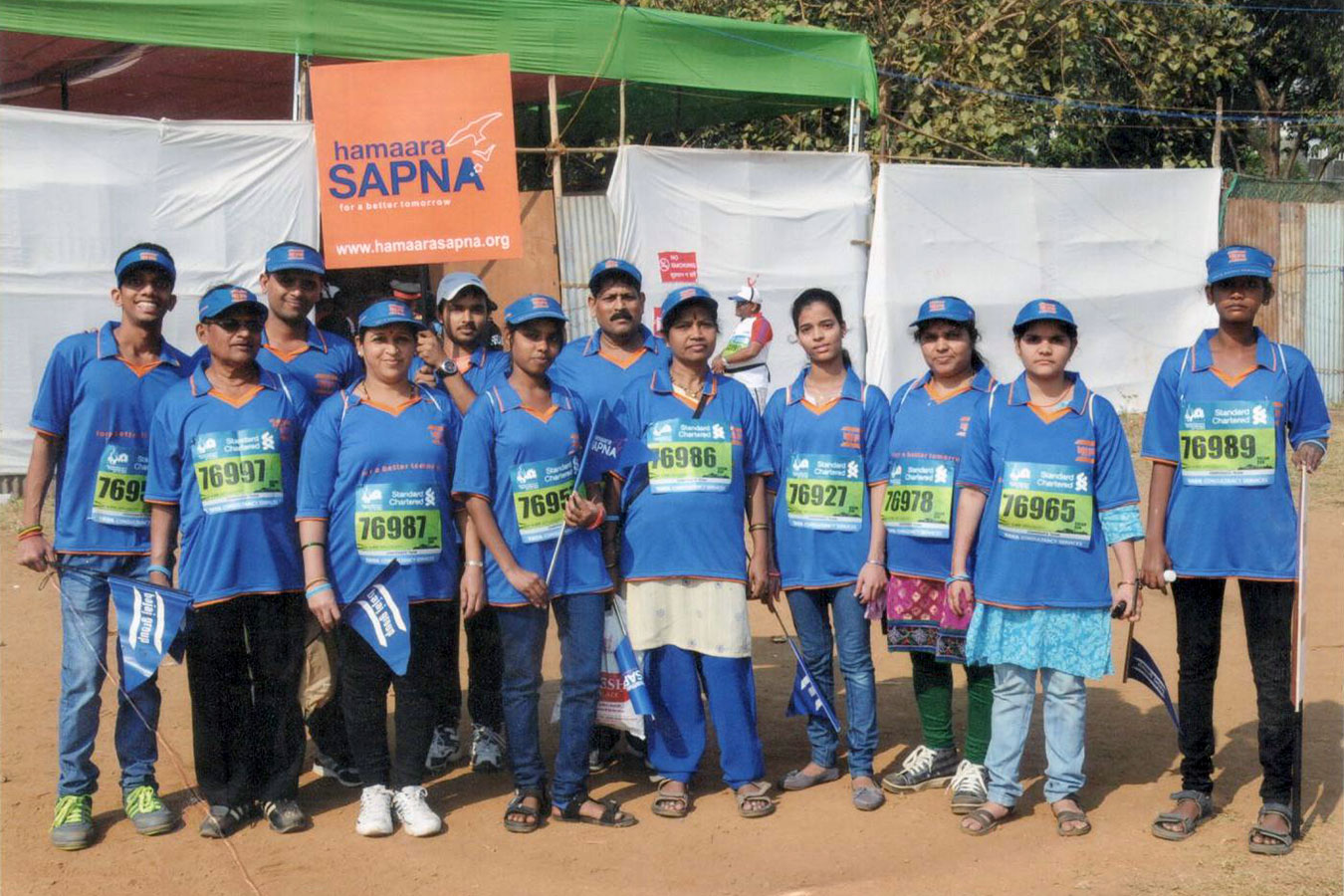 Staff and beneficiaries under the Hamaara Sapna Banner at the Mumbai Marathon (January, 2015)