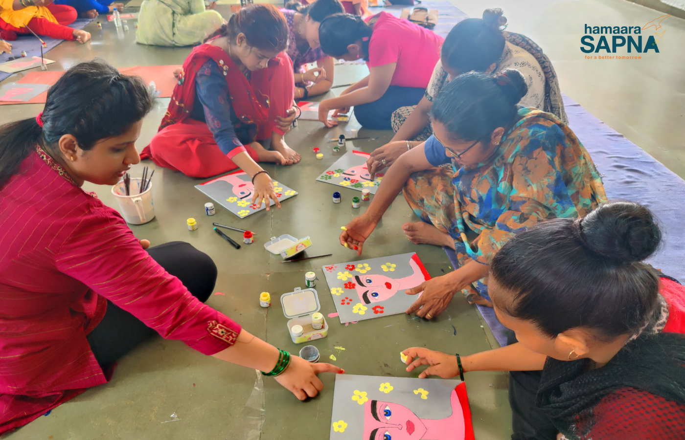 Painting on canvas is a joy which the ladies learnt when they made a beautiful portrait of a lady with flowers